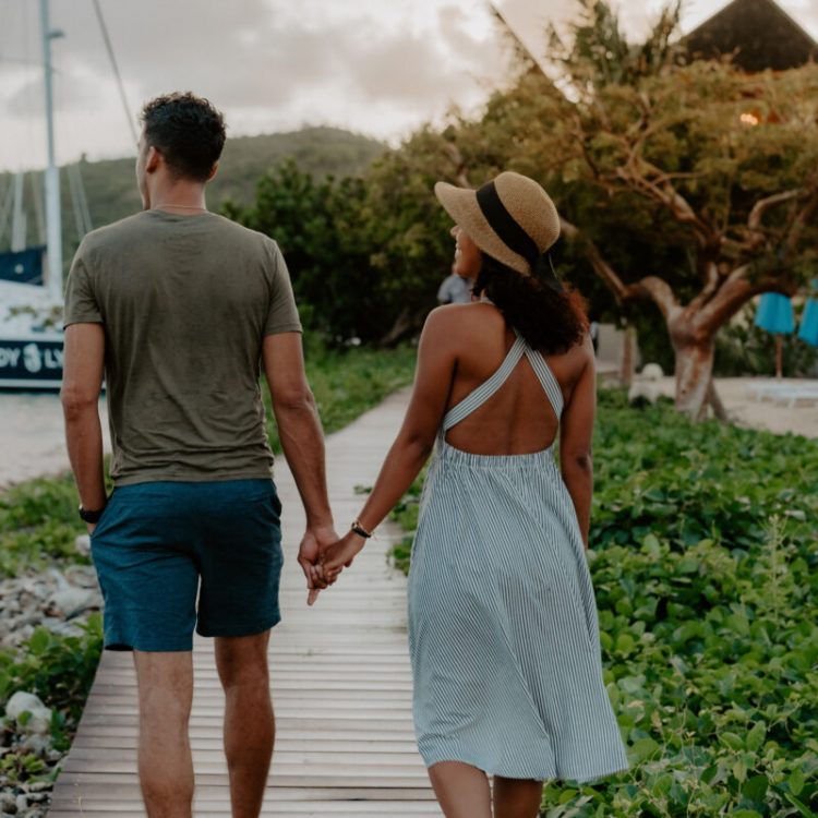 A man and woman holding hands